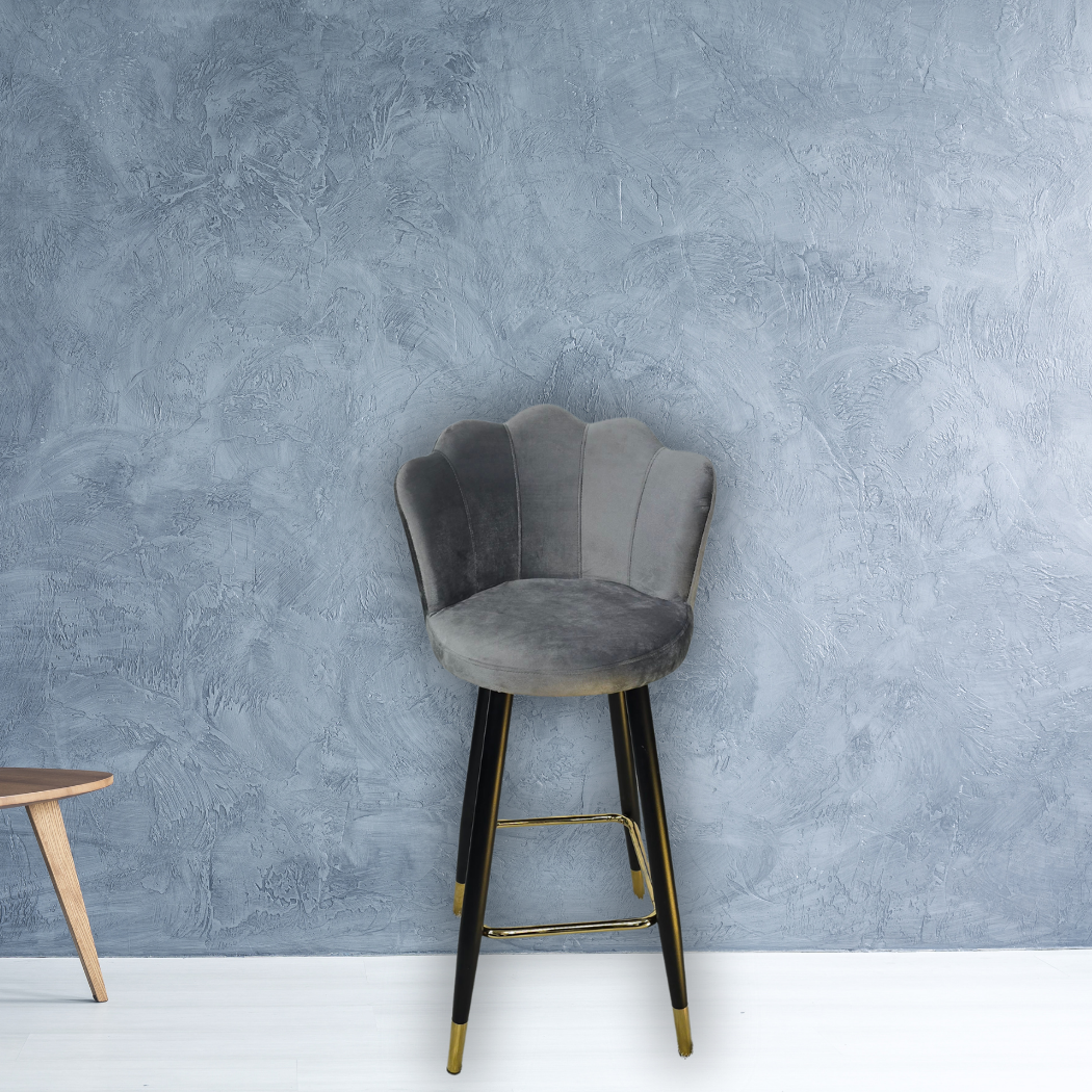 Grey with wavy top, black legs with gold bottoms and square metal ring between legs