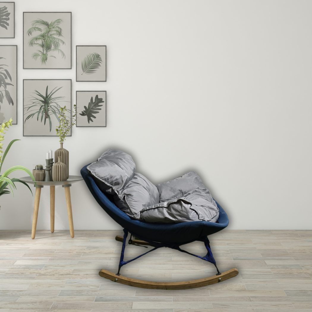 Rocking chair with grey detachable cushion on top, dark blue base with black bars and brown curved wood