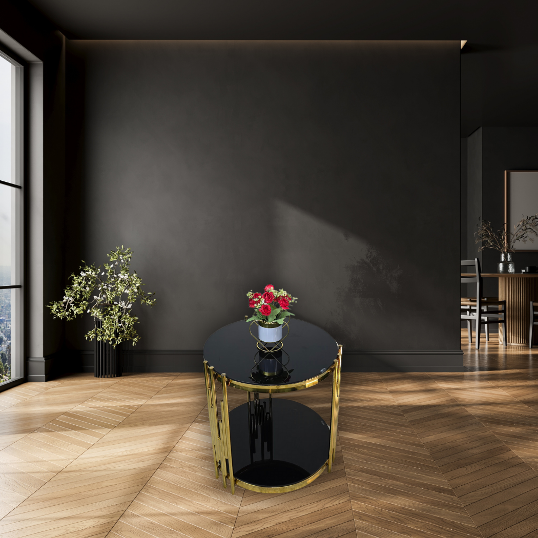 Round, small, black top & base with gold bars on 3 surrounding sides