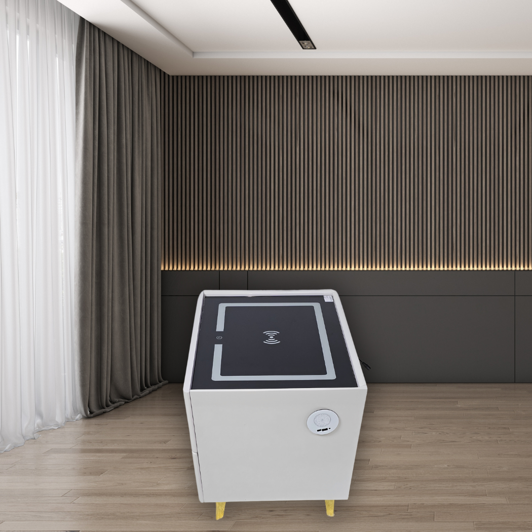 Cube shape,white with black top, touch screen wireless charging station and 2 drawers with gold and black handles