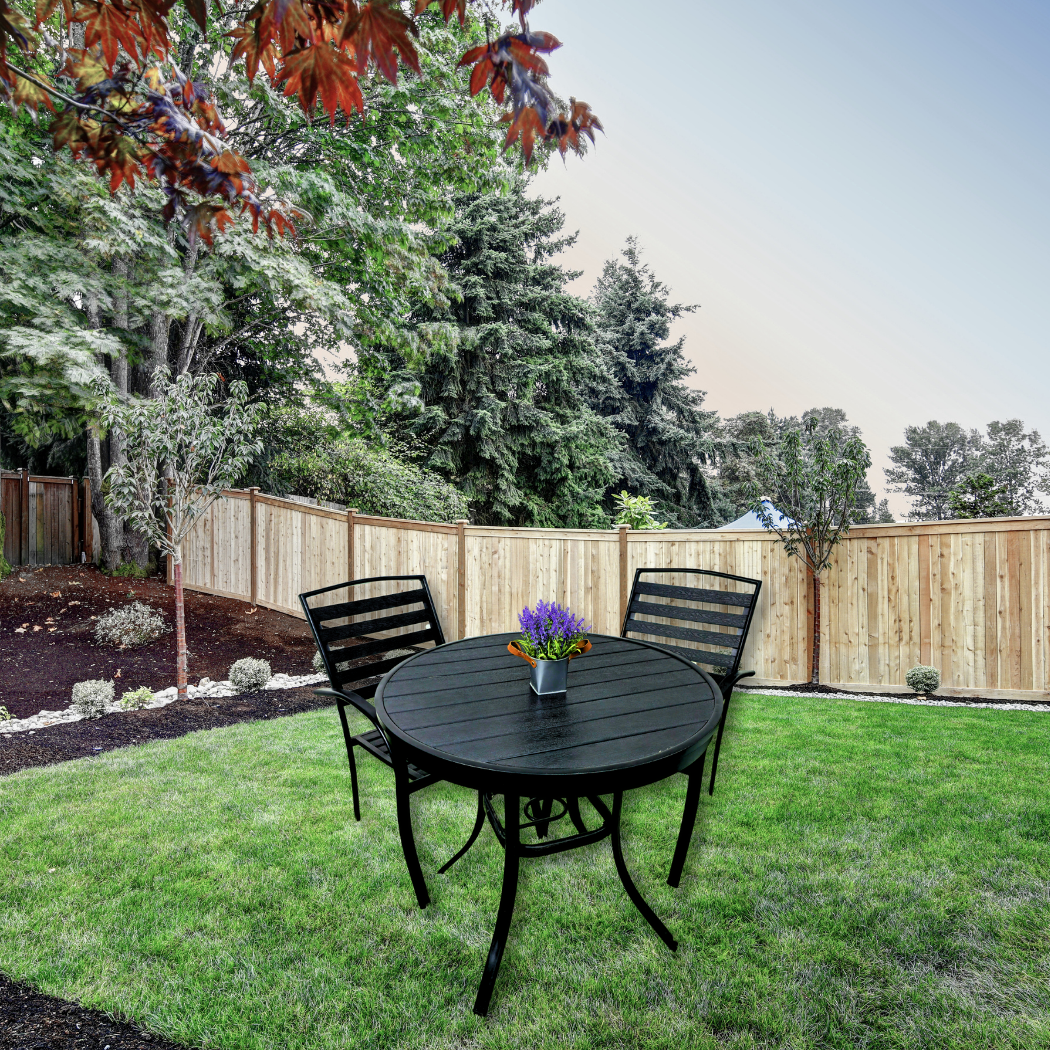 Round, all black wooden top with 4 black metal legs (held together by square black metal and round shape in the middle)