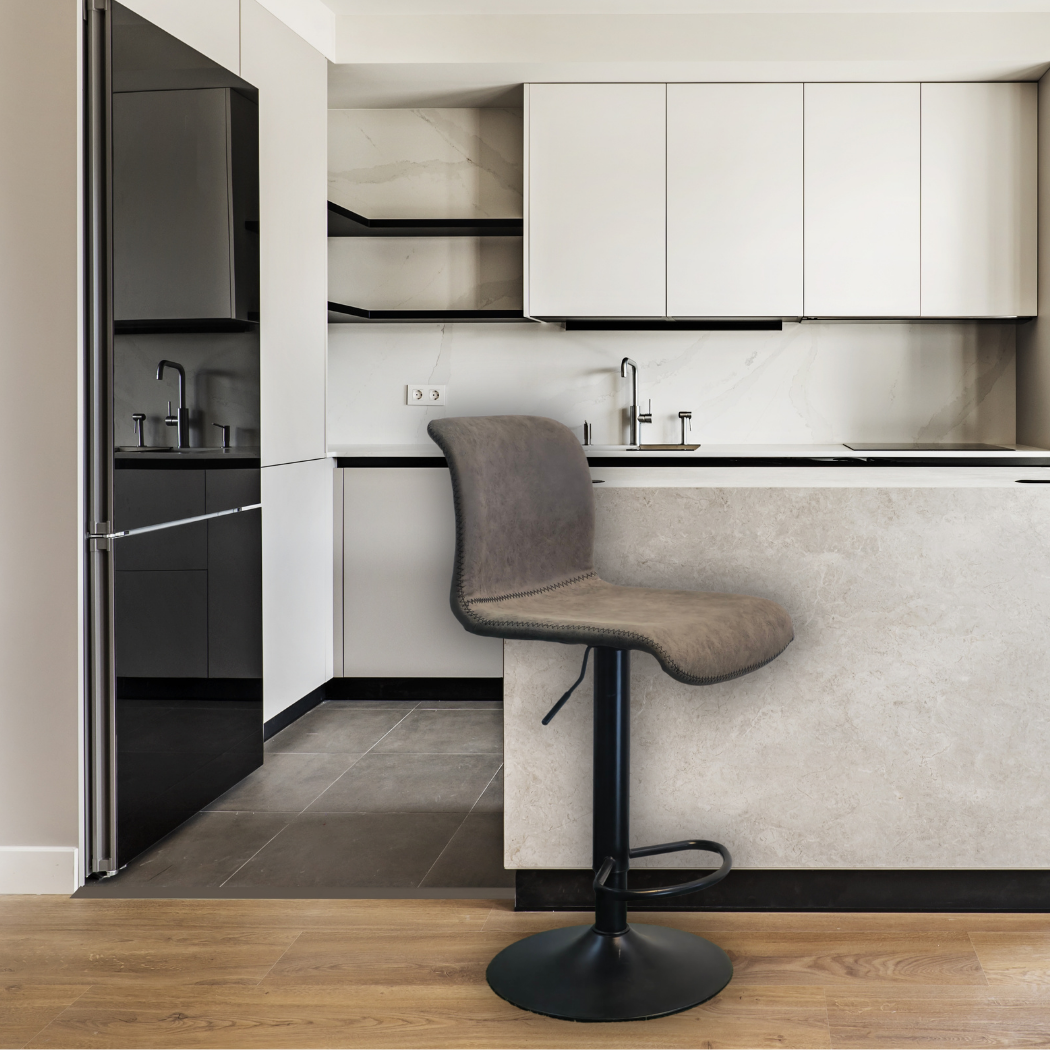 Dark brown cushion top with dark brown base, height adjustable with black pole leg, circle base & foot rest