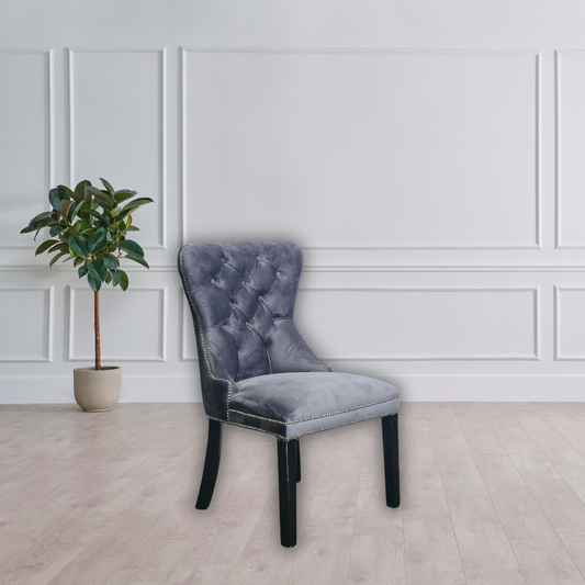 Grey, braided cushion with black legs