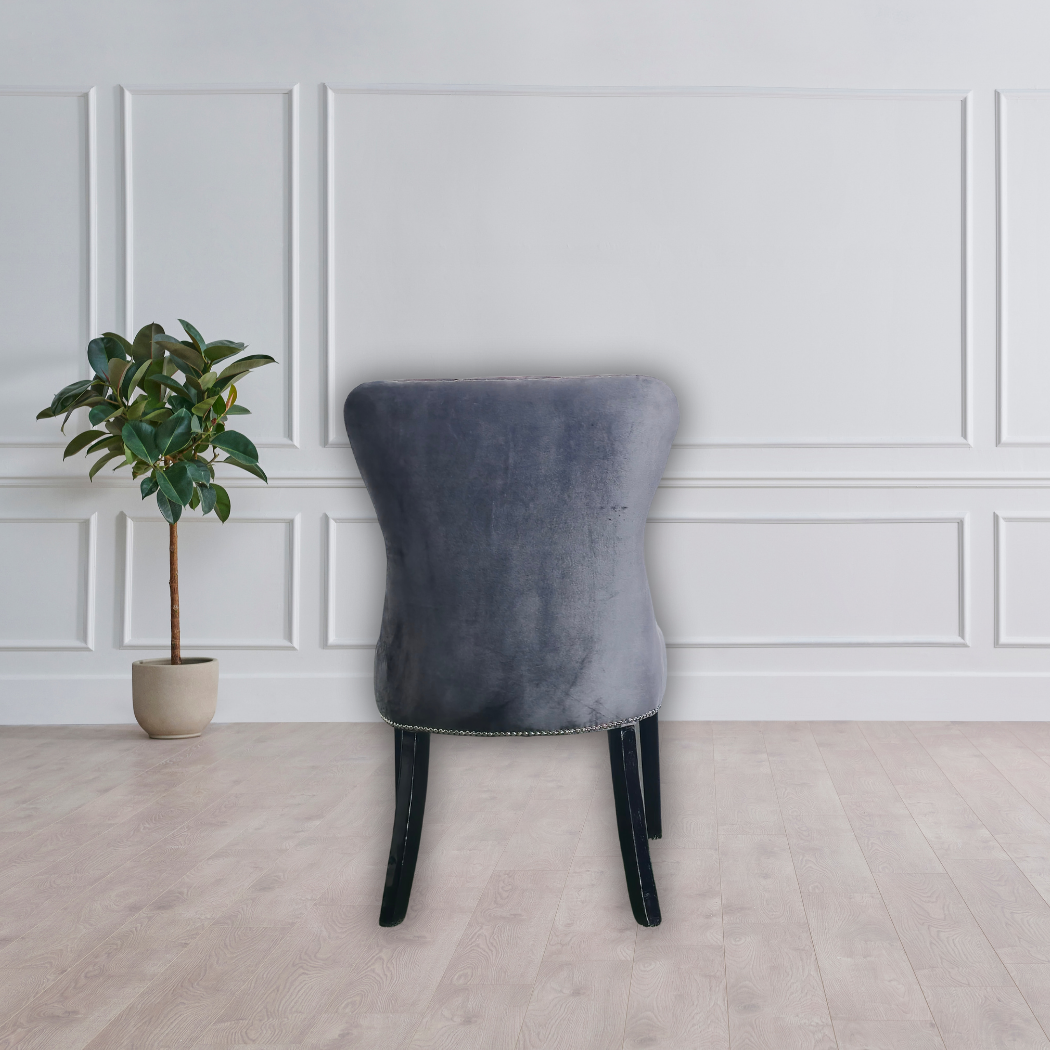 Grey, braided cushion with black legs