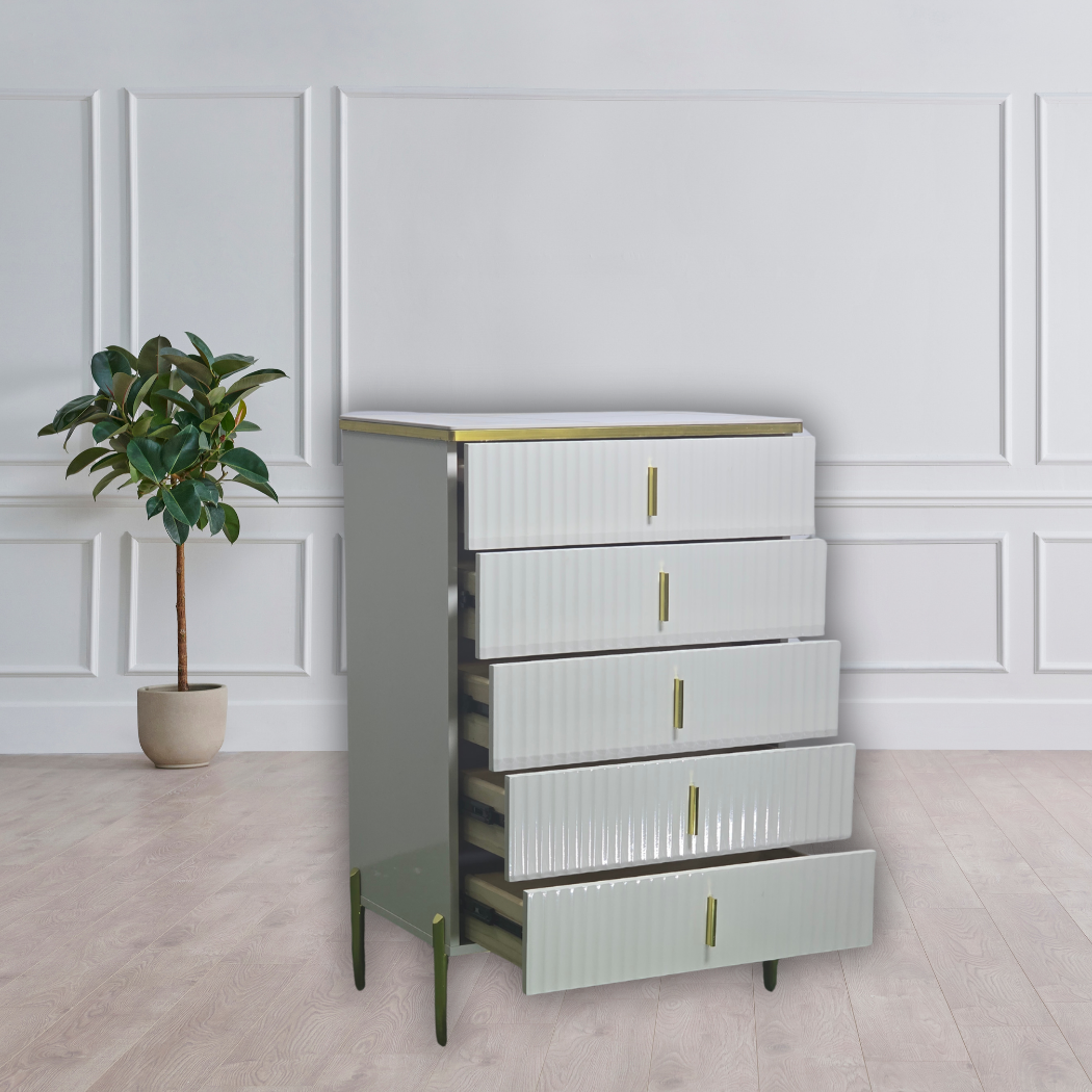 White marble top with black and gold lines, gold outline on top and door handles (5 drawers)